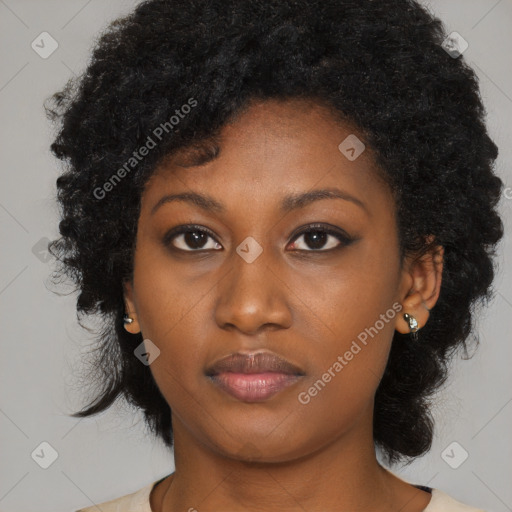 Joyful black young-adult female with medium  black hair and brown eyes