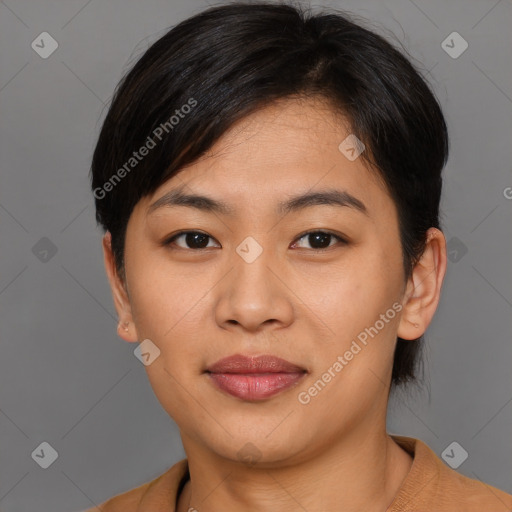 Joyful asian young-adult female with short  black hair and brown eyes