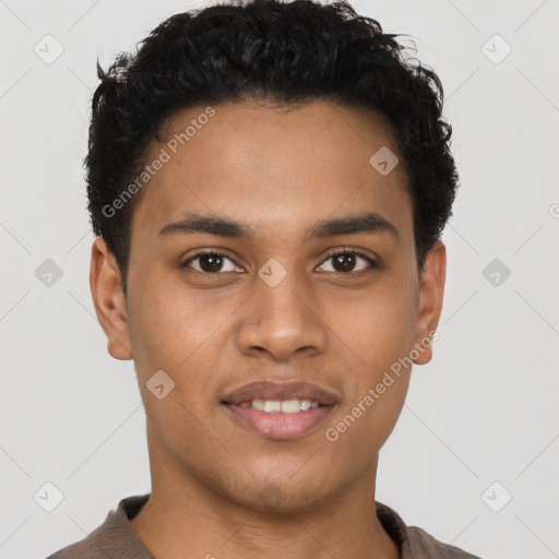 Joyful latino young-adult male with short  brown hair and brown eyes