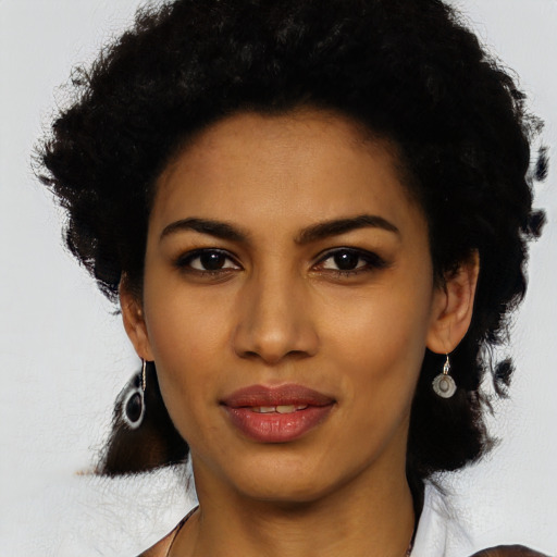 Joyful latino young-adult female with short  black hair and brown eyes