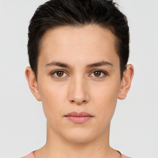 Neutral white young-adult female with short  brown hair and brown eyes