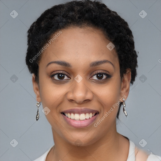 Joyful black young-adult female with short  brown hair and brown eyes