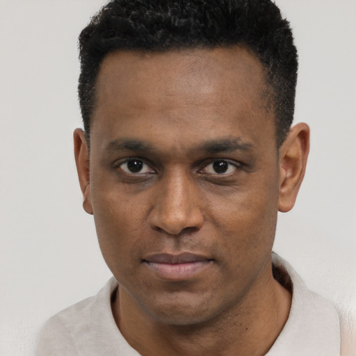 Neutral black young-adult male with short  black hair and brown eyes