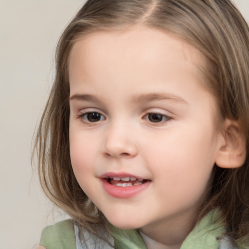 Joyful white child female with medium  brown hair and brown eyes