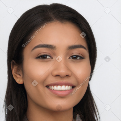 Joyful latino young-adult female with long  brown hair and brown eyes