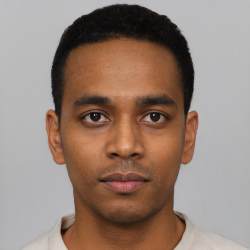 Neutral latino young-adult male with short  black hair and brown eyes