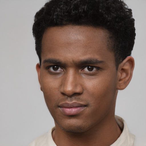 Neutral black young-adult male with short  brown hair and brown eyes