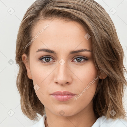 Neutral white young-adult female with medium  brown hair and brown eyes