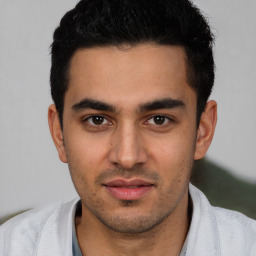 Neutral white young-adult male with short  black hair and brown eyes