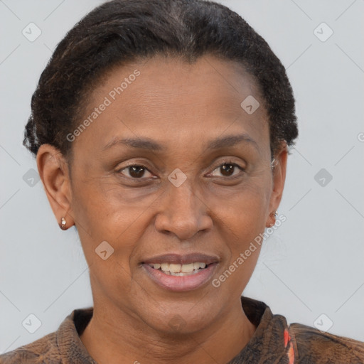 Joyful black adult female with short  brown hair and brown eyes