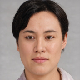 Neutral asian young-adult female with medium  brown hair and brown eyes