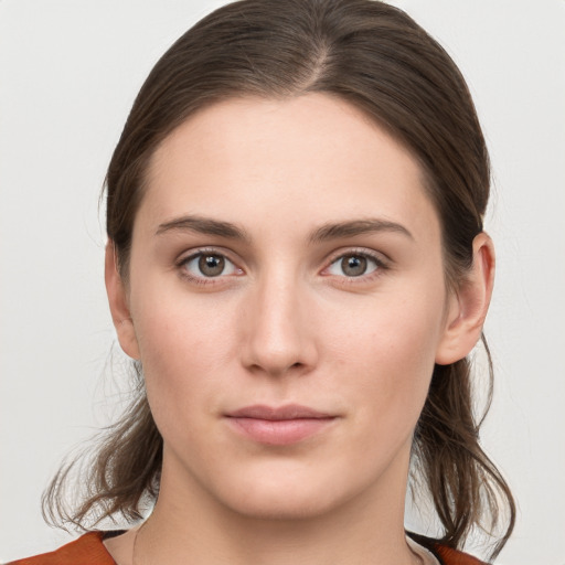 Neutral white young-adult female with medium  brown hair and grey eyes