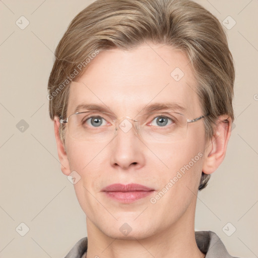 Joyful white adult male with short  brown hair and grey eyes