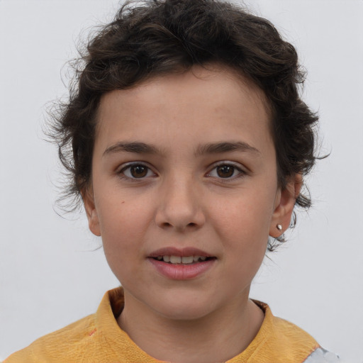 Joyful white child female with medium  brown hair and brown eyes