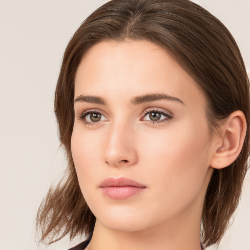 Neutral white young-adult female with medium  brown hair and brown eyes