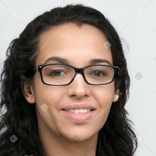 Joyful latino young-adult female with long  brown hair and brown eyes