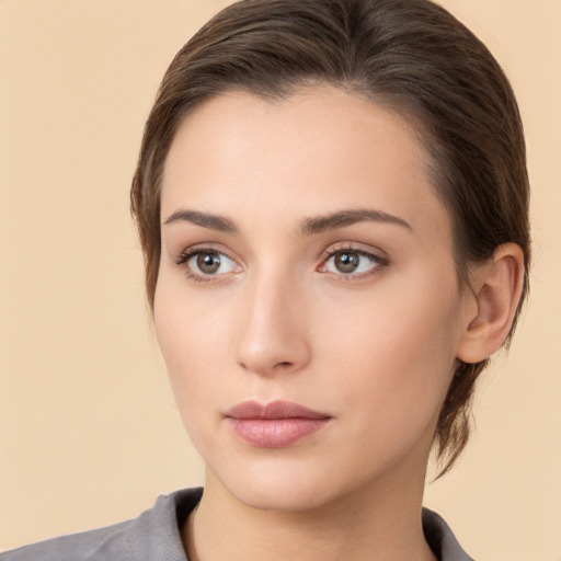 Neutral white young-adult female with medium  brown hair and brown eyes