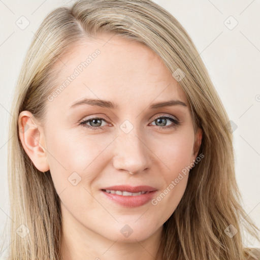 Joyful white young-adult female with long  brown hair and blue eyes