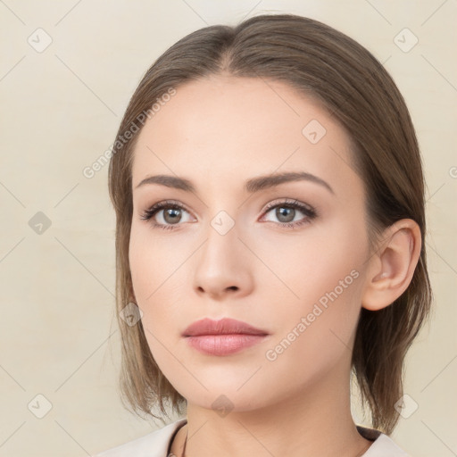 Neutral white young-adult female with medium  brown hair and brown eyes