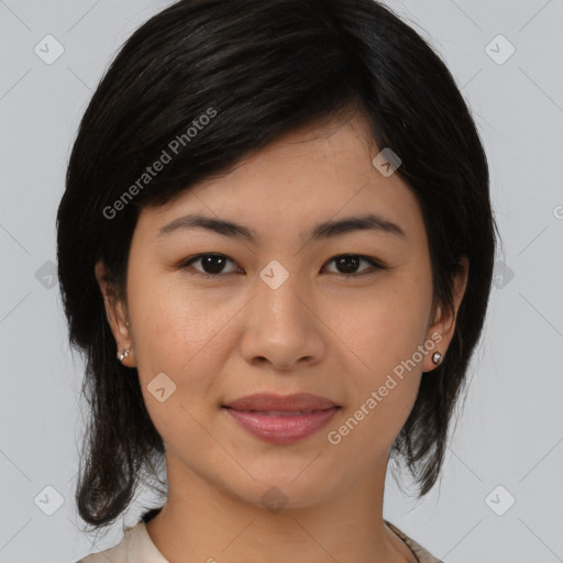 Joyful asian young-adult female with medium  black hair and brown eyes