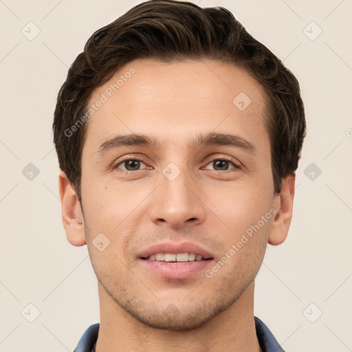 Joyful white young-adult male with short  brown hair and grey eyes