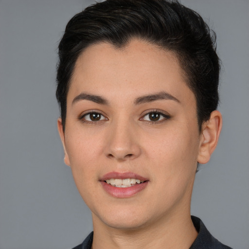 Joyful white young-adult female with short  brown hair and brown eyes
