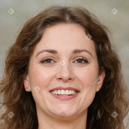 Joyful white young-adult female with long  brown hair and green eyes