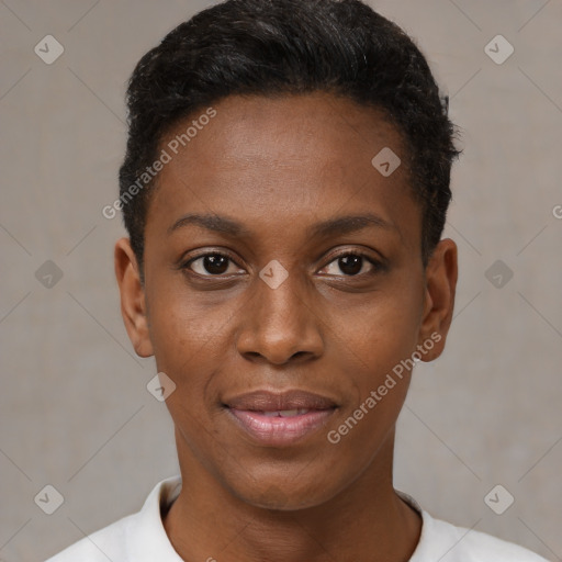 Joyful black young-adult female with short  black hair and brown eyes