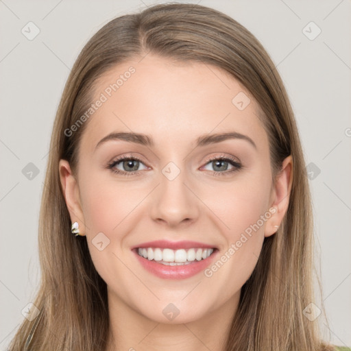 Joyful white young-adult female with long  brown hair and grey eyes