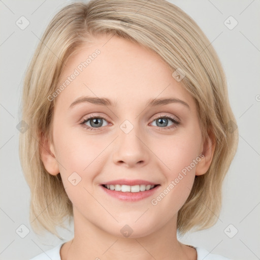 Joyful white young-adult female with medium  brown hair and blue eyes