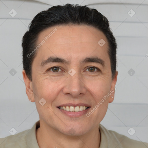 Joyful white adult male with short  brown hair and brown eyes