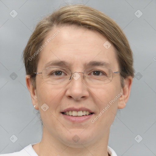 Joyful white adult female with short  brown hair and grey eyes