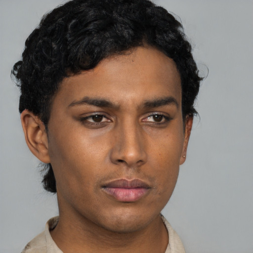 Neutral latino young-adult male with short  brown hair and brown eyes