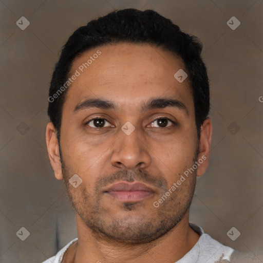 Neutral latino young-adult male with short  black hair and brown eyes