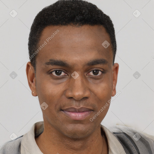 Joyful black young-adult male with short  black hair and brown eyes