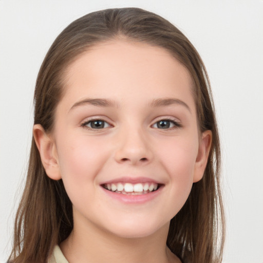 Joyful white child female with long  brown hair and brown eyes