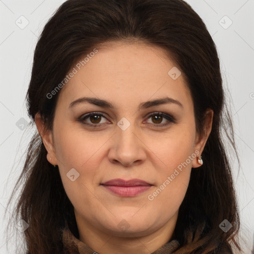 Joyful white adult female with long  brown hair and brown eyes