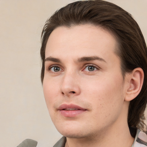 Neutral white young-adult male with medium  brown hair and grey eyes