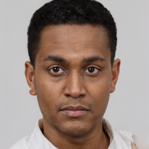 Neutral black young-adult male with short  black hair and brown eyes