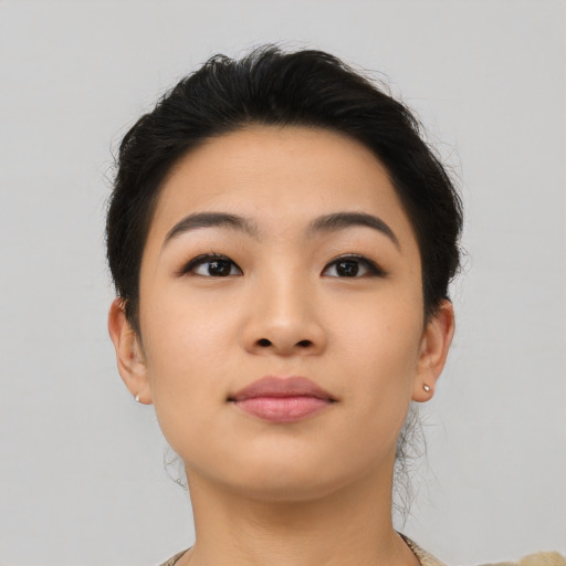 Neutral asian young-adult female with short  brown hair and brown eyes