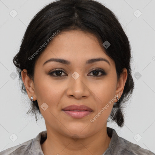 Joyful latino young-adult female with medium  brown hair and brown eyes