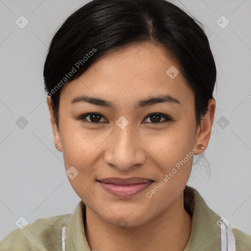 Joyful asian young-adult female with medium  brown hair and brown eyes