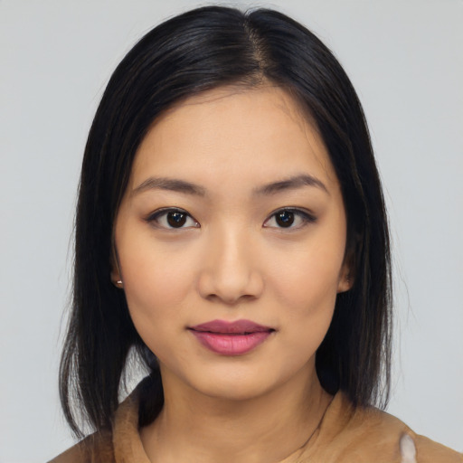 Neutral latino young-adult female with long  black hair and brown eyes
