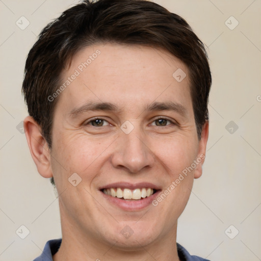 Joyful white adult male with short  brown hair and brown eyes