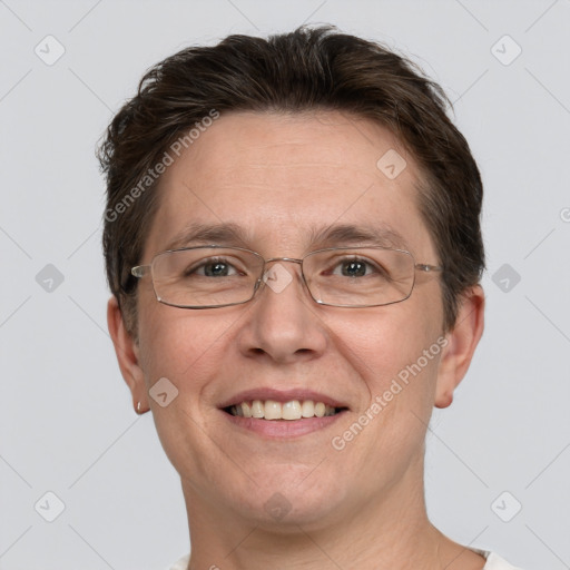 Joyful white adult male with short  brown hair and grey eyes