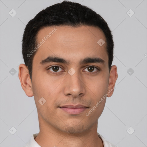 Joyful latino young-adult male with short  black hair and brown eyes