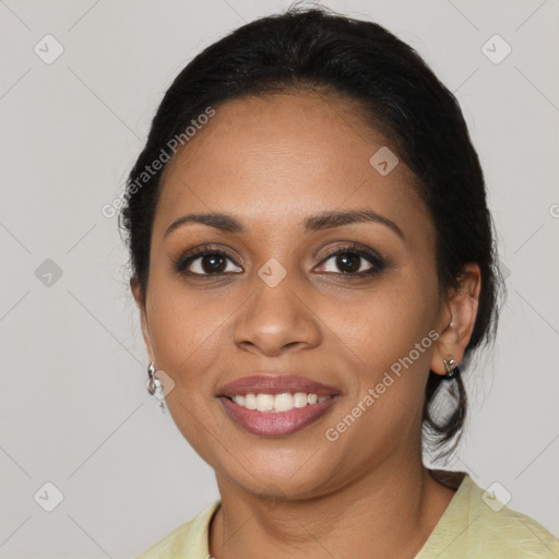 Joyful black young-adult female with medium  brown hair and brown eyes