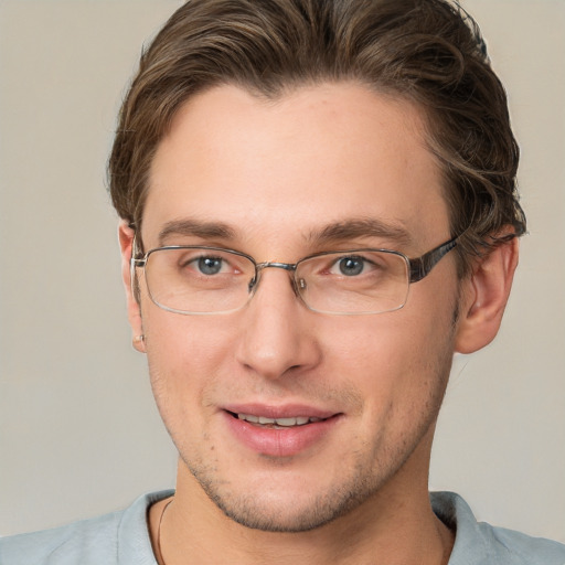 Joyful white adult male with short  brown hair and grey eyes