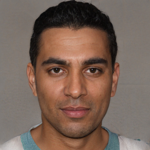 Neutral white young-adult male with short  black hair and brown eyes