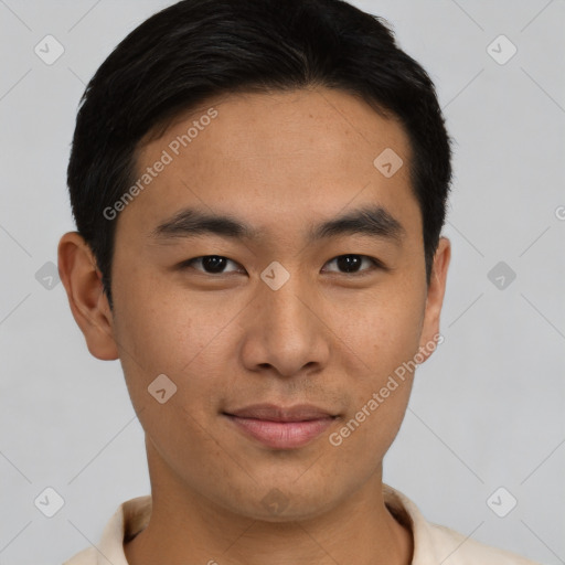 Joyful asian young-adult male with short  black hair and brown eyes